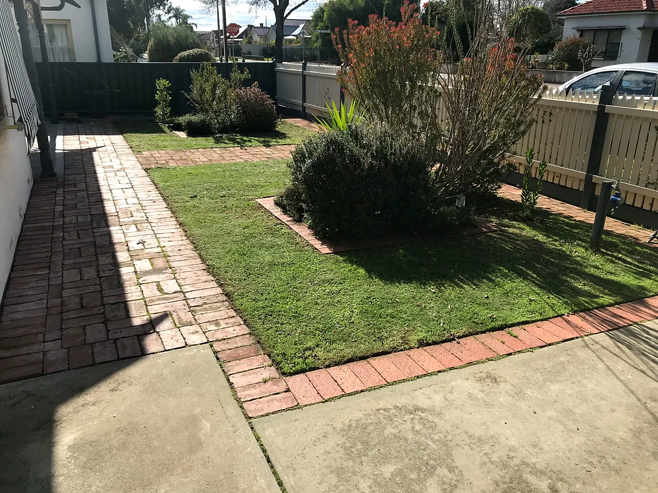 Freshly mulched and edged garden bed